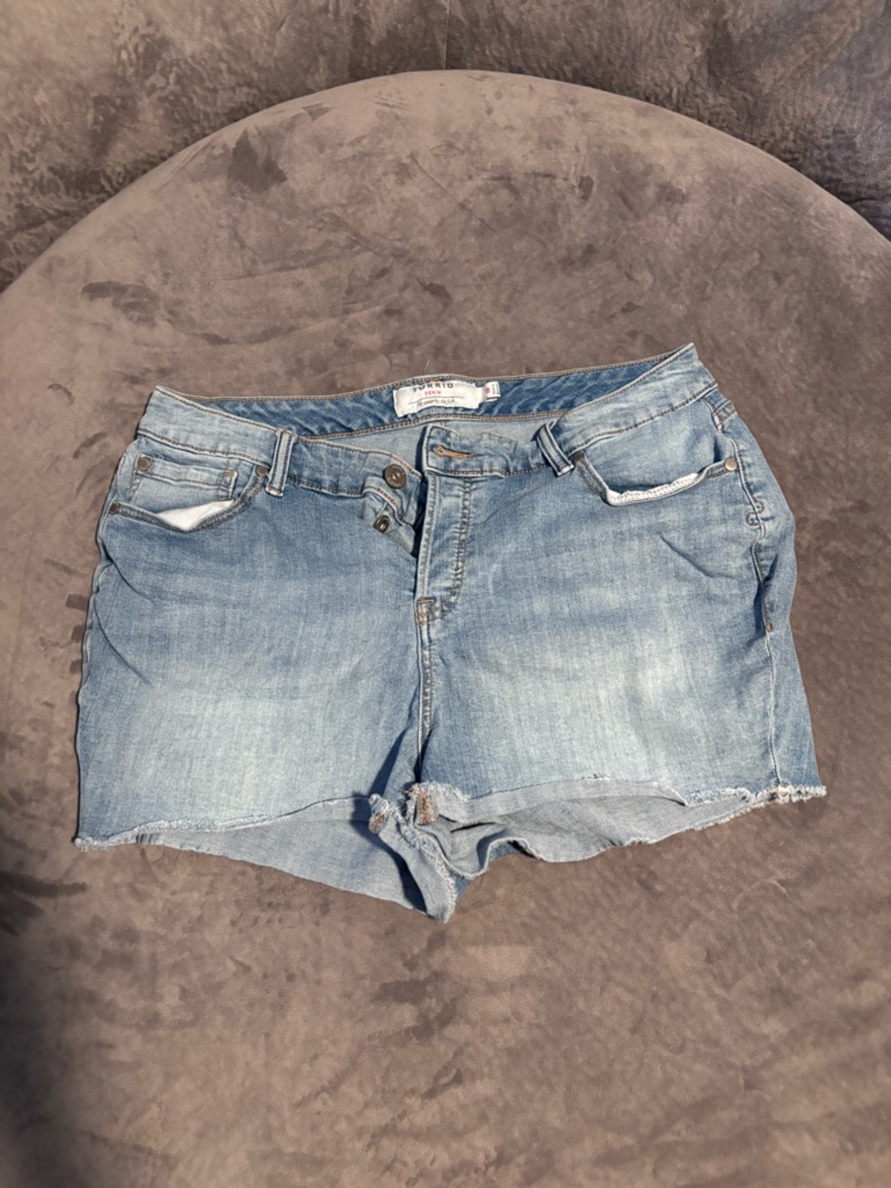 Torrid light wash distressed button fly shorts size 18